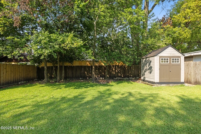 1094 Wolfe St, Jacksonville, FL 32205 - fenced backyard featuring a storage unit