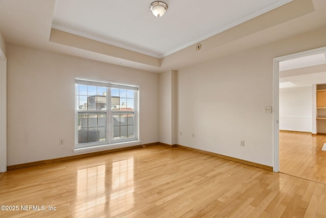 400 E Bay St Unit 401, Jacksonville, FL 32202 - unfurnished room with light wood-style flooring and ornamental molding