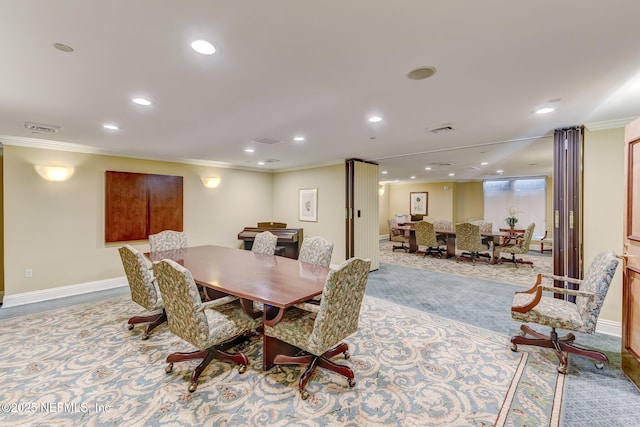 400 E Bay St Unit 401, Jacksonville, FL 32202 - carpeted dining space featuring ornamental molding and recessed lighting