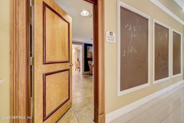 400 E Bay St Unit 401, Jacksonville, FL 32202 - hallway featuring light tile patterned floors and baseboards