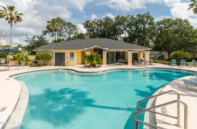 1800 The Greens Way Unit 603, Jacksonville Beach, FL 32250 - community pool featuring a patio area