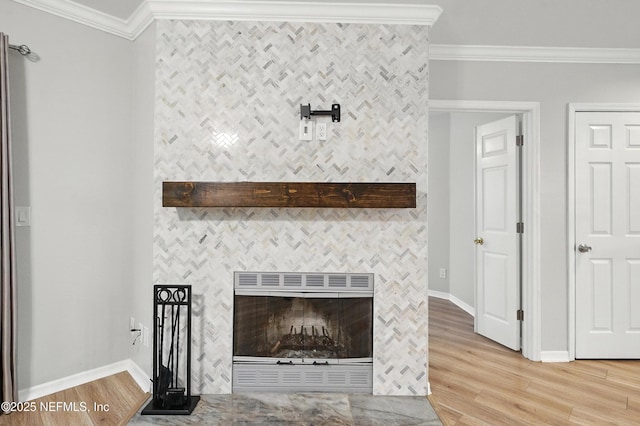1800 The Greens Way Unit 603, Jacksonville Beach, FL 32250 - detailed view of ornamental molding, wood finished floors, and a tiled fireplace
