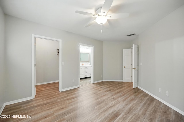 1800 The Greens Way Unit 603, Jacksonville Beach, FL 32250 - spare room featuring light wood-type flooring and a ceiling fan