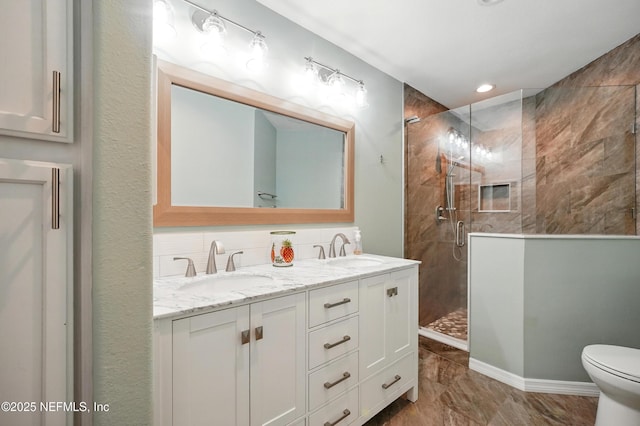 1800 The Greens Way Unit 603, Jacksonville Beach, FL 32250 - full bath featuring a stall shower and double vanity