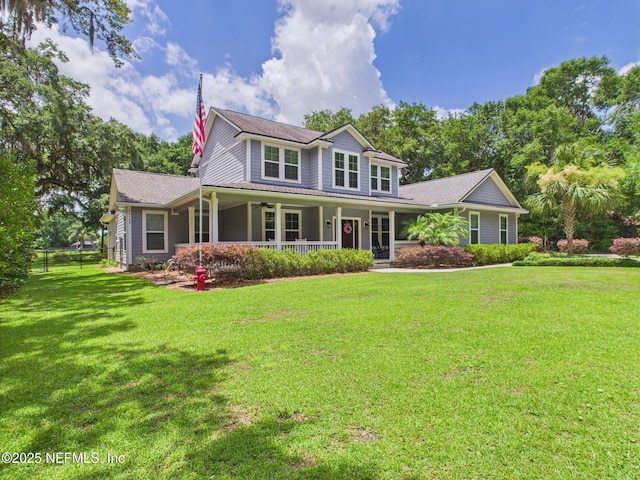 96168 High Pointe Dr, Fernandina Beach, FL 32034 - view of front of home with a ceiling fan and covered porch