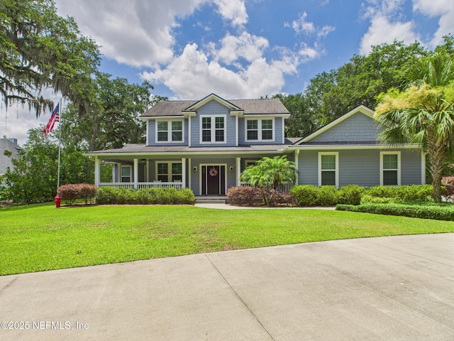 96168 High Pointe Dr, Fernandina Beach, FL 32034 - view of front facade with covered porch and a front yard
