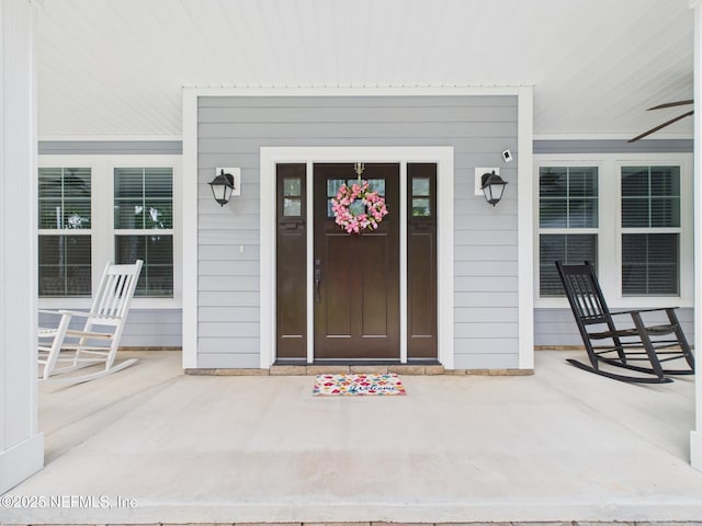 96168 High Pointe Dr, Fernandina Beach, FL 32034 - view of exterior entry featuring a porch
