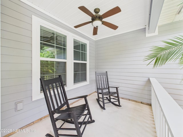 96168 High Pointe Dr, Fernandina Beach, FL 32034 - covered porch featuring a ceiling fan