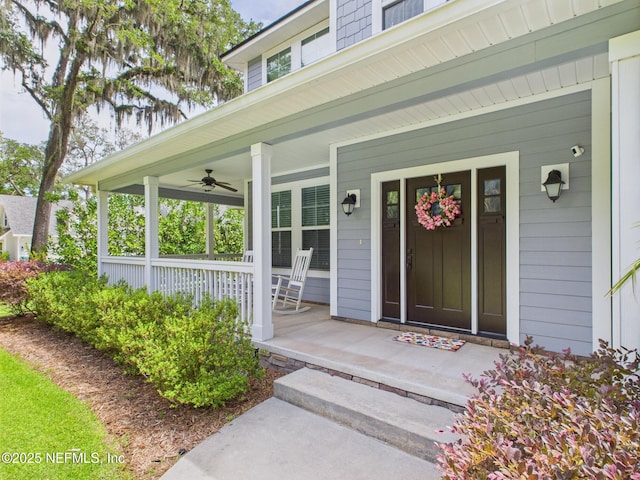96168 High Pointe Dr, Fernandina Beach, FL 32034 - doorway to property featuring a porch, ceiling fan, and a surveillance system