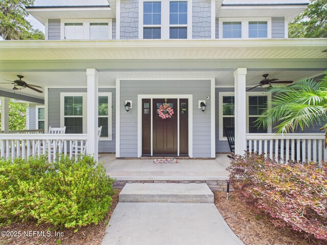 96168 High Pointe Dr, Fernandina Beach, FL 32034 - view of exterior entry featuring ceiling fan and covered porch