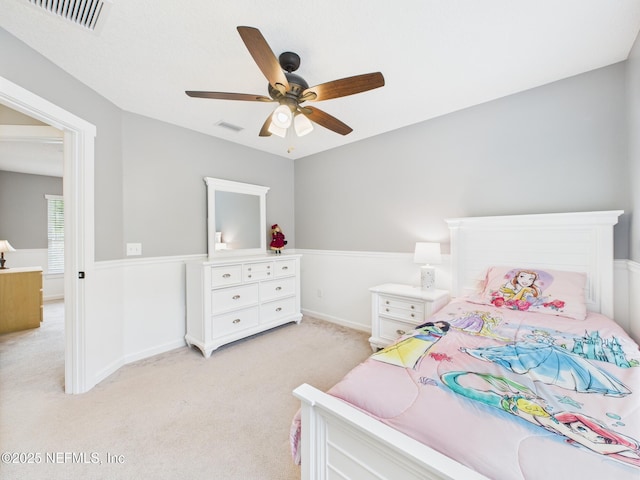 96168 High Pointe Dr, Fernandina Beach, FL 32034 - bedroom with light colored carpet and a ceiling fan