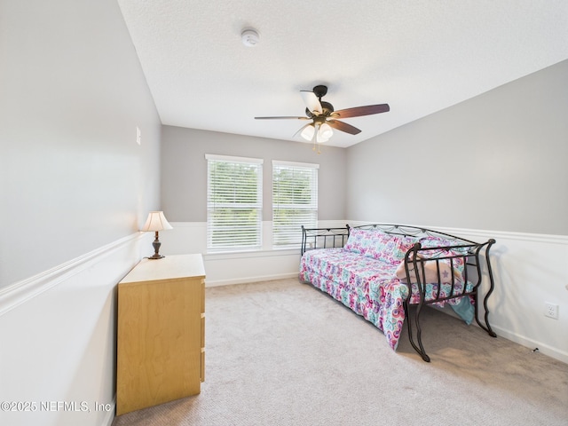 96168 High Pointe Dr, Fernandina Beach, FL 32034 - carpeted bedroom featuring baseboards and ceiling fan