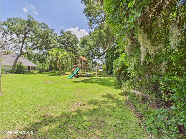 96168 High Pointe Dr, Fernandina Beach, FL 32034 - view of green lawn with a playground