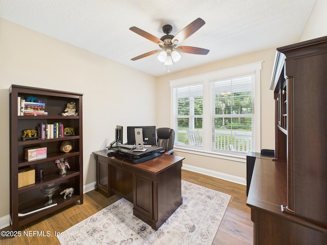 96168 High Pointe Dr, Fernandina Beach, FL 32034 - office space featuring a ceiling fan and wood finished floors
