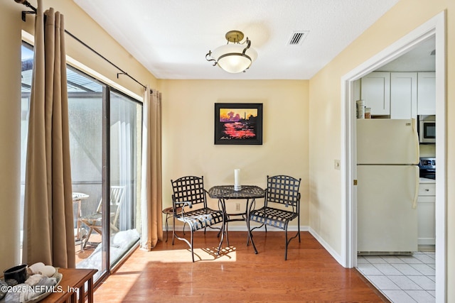 3960 A1A S Unit 505, Saint Augustine Beach, FL 32080 - living area featuring wood finished floors