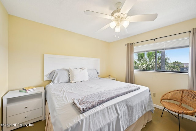 3960 A1A S Unit 505, Saint Augustine Beach, FL 32080 - bedroom with wood finished floors and ceiling fan