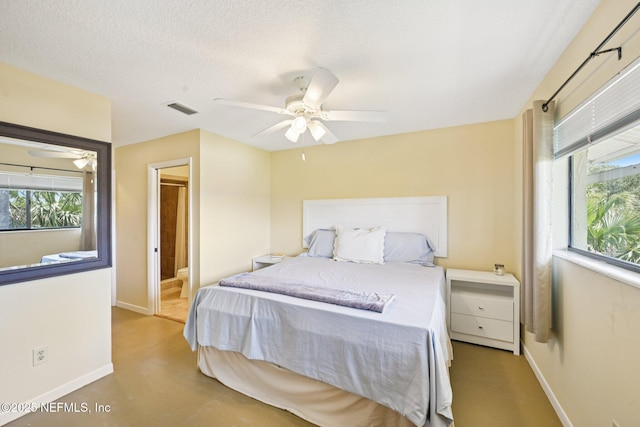 3960 A1A S Unit 505, Saint Augustine Beach, FL 32080 - bedroom featuring ceiling fan and ensuite bathroom