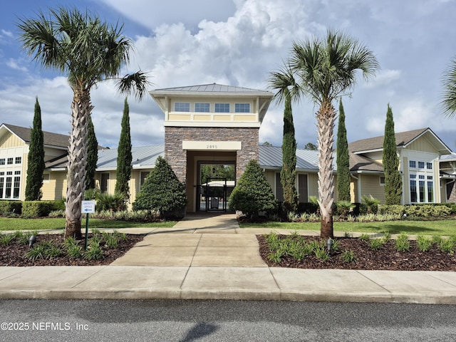 2420 Cold Stream Ln, Green Cove Springs, FL 32043 - view of front facade featuring a standing seam roof, metal roof, and stone siding
