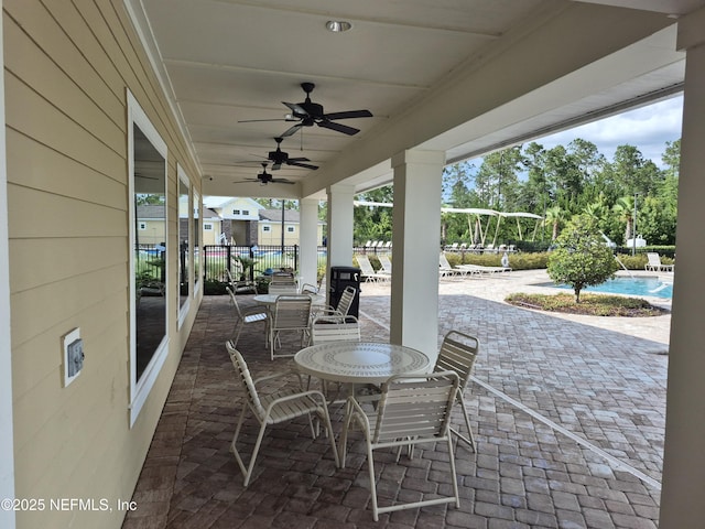 2420 Cold Stream Ln, Green Cove Springs, FL 32043 - view of patio featuring a community pool and ceiling fan
