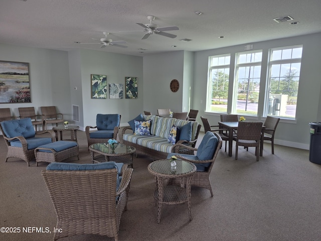 2420 Cold Stream Ln, Green Cove Springs, FL 32043 - living area with carpet floors, a ceiling fan, and baseboards