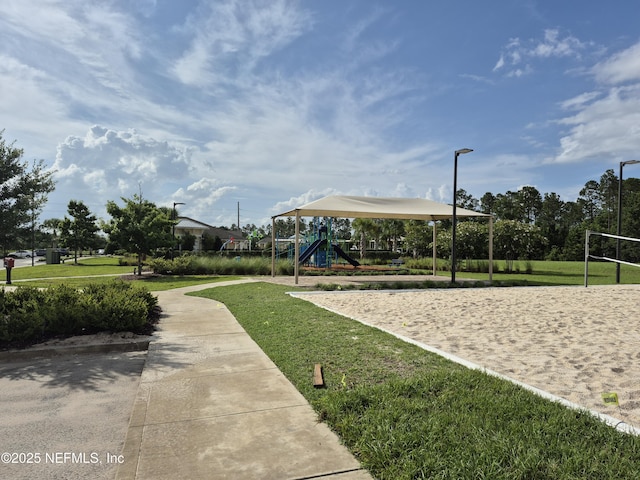 2420 Cold Stream Ln, Green Cove Springs, FL 32043 - surrounding community with a yard and volleyball court