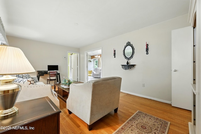 1206 Nightingale Ct, Jacksonville, FL 32216 - living area featuring light wood-type flooring and baseboards