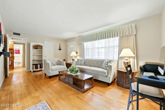 1206 Nightingale Ct, Jacksonville, FL 32216 - living room with hardwood / wood-style floors