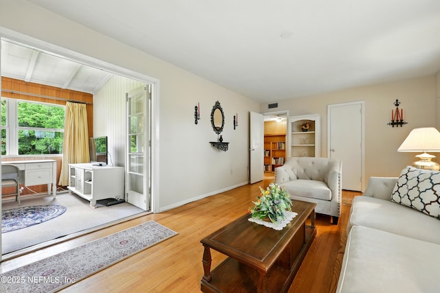 1206 Nightingale Ct, Jacksonville, FL 32216 - living room featuring wood finished floors and an office area