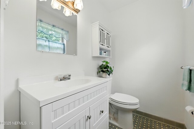 1206 Nightingale Ct, Jacksonville, FL 32216 - half bath featuring vanity and tile patterned floors