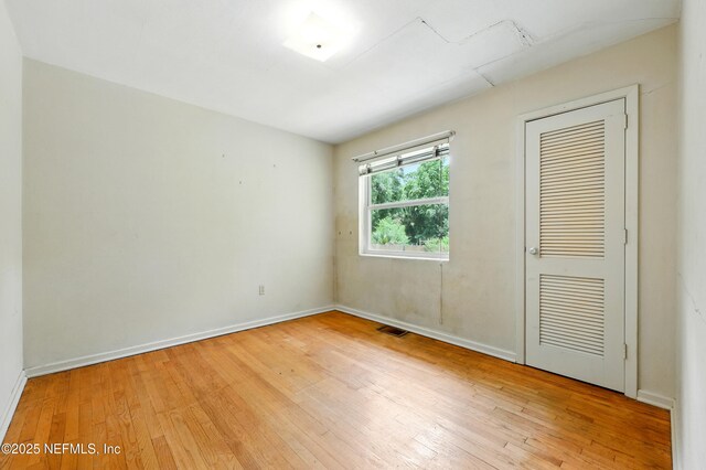 1206 Nightingale Ct, Jacksonville, FL 32216 - empty room with light wood-style flooring and baseboards