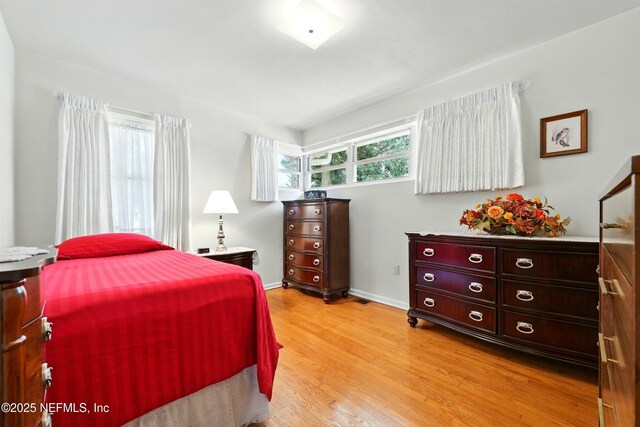 1206 Nightingale Ct, Jacksonville, FL 32216 - bedroom with light wood-style flooring and baseboards