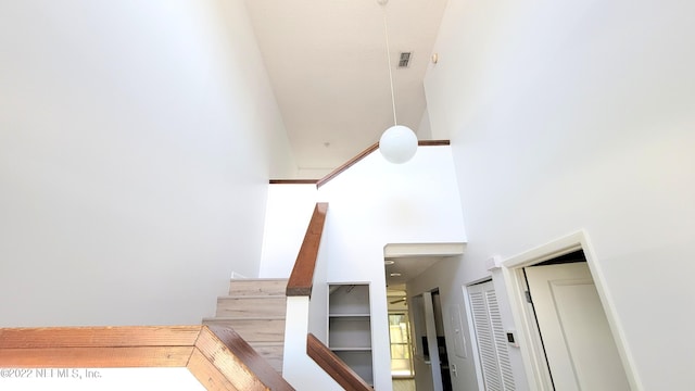 9360 Craven Rd Unit 703, Jacksonville, FL 32257 - staircase featuring high vaulted ceiling