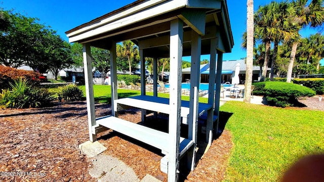 9360 Craven Rd Unit 703, Jacksonville, FL 32257 - view of grassy yard featuring an outdoor pool