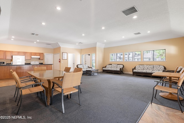9360 Craven Rd Unit 703, Jacksonville, FL 32257 - dining area featuring recessed lighting, light carpet, and a textured ceiling