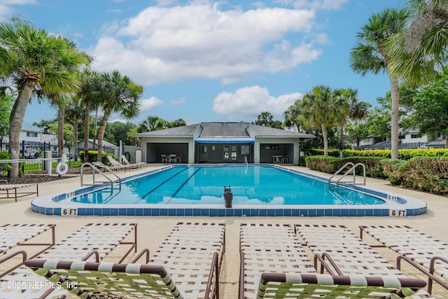 9360 Craven Rd Unit 703, Jacksonville, FL 32257 - community pool featuring a patio