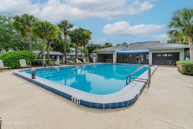 9360 Craven Rd Unit 703, Jacksonville, FL 32257 - community pool featuring a patio area