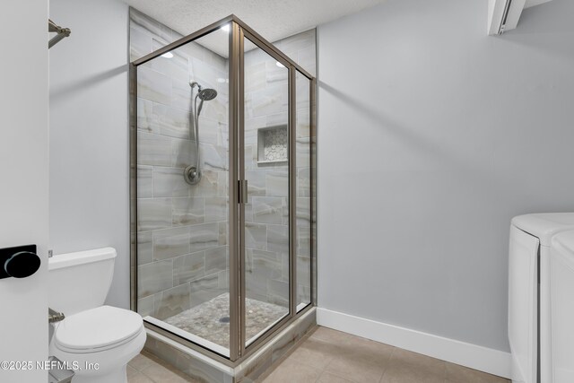 9360 Craven Rd Unit 703, Jacksonville, FL 32257 - full bathroom featuring a stall shower, washer / dryer, and tile patterned floors