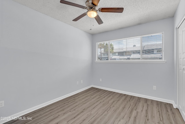 9360 Craven Rd Unit 703, Jacksonville, FL 32257 - spare room with wood finished floors, a textured ceiling, and ceiling fan