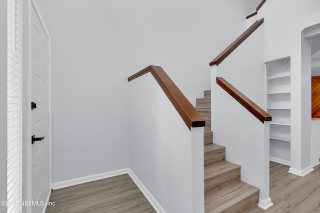 9360 Craven Rd Unit 703, Jacksonville, FL 32257 - staircase featuring wood finished floors and baseboards