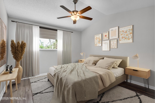 9360 Craven Rd Unit 703, Jacksonville, FL 32257 - bedroom with wood finished floors, vaulted ceiling, and ceiling fan
