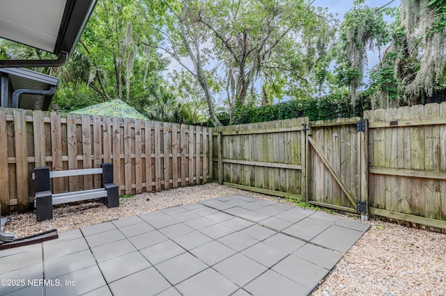 9360 Craven Rd Unit 703, Jacksonville, FL 32257 - fenced backyard featuring a patio area and a gate