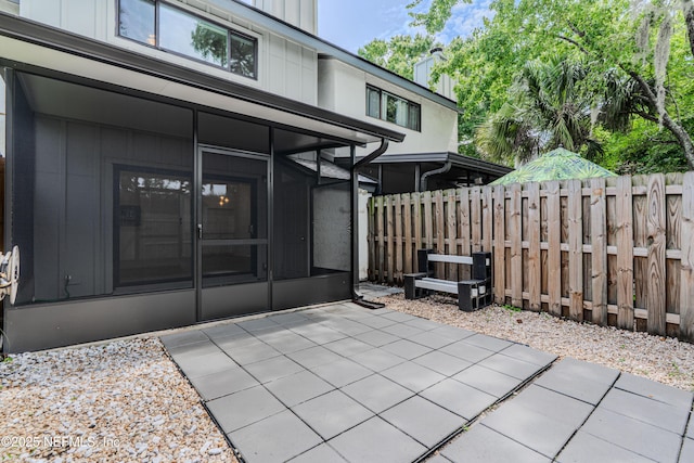 9360 Craven Rd Unit 703, Jacksonville, FL 32257 - view of patio / terrace featuring a sunroom