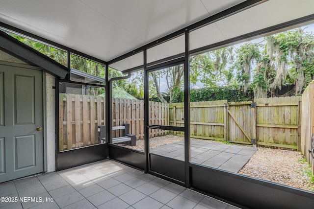 9360 Craven Rd Unit 703, Jacksonville, FL 32257 - unfurnished sunroom featuring plenty of natural light