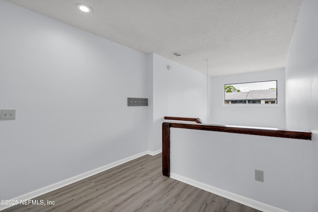 9360 Craven Rd Unit 703, Jacksonville, FL 32257 - unfurnished room with wood finished floors and recessed lighting