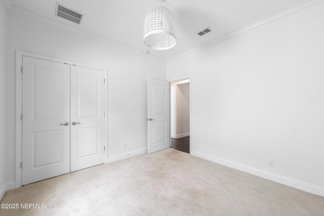 97082 Harbor Concourse Cir, Fernandina Beach, FL 32034 - unfurnished bedroom with carpet floors, ornamental molding, and a closet