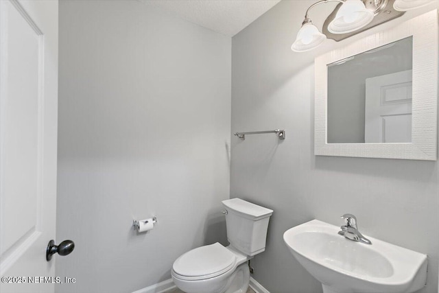 8550 Argyle Business Loop Unit 406, Jacksonville, FL 32244 - half bath featuring toilet and a sink