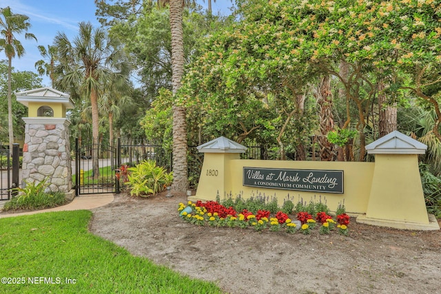 1800 The Greens Way Unit 605, Jacksonville Beach, FL 32250 - community sign with a gate