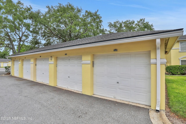 1800 The Greens Way Unit 605, Jacksonville Beach, FL 32250 - view of garage