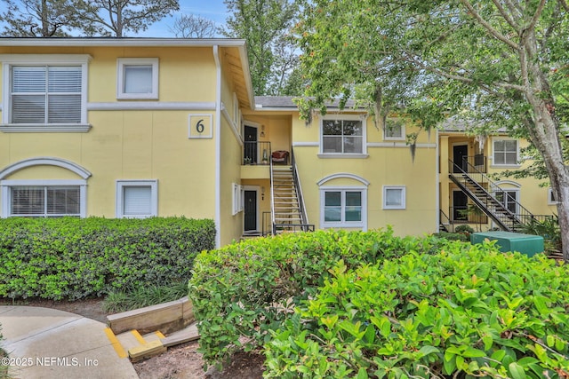1800 The Greens Way Unit 605, Jacksonville Beach, FL 32250 - view of building exterior with stairs