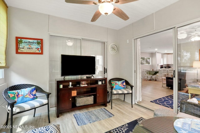 1800 The Greens Way Unit 605, Jacksonville Beach, FL 32250 - living room featuring a ceiling fan and wood finished floors